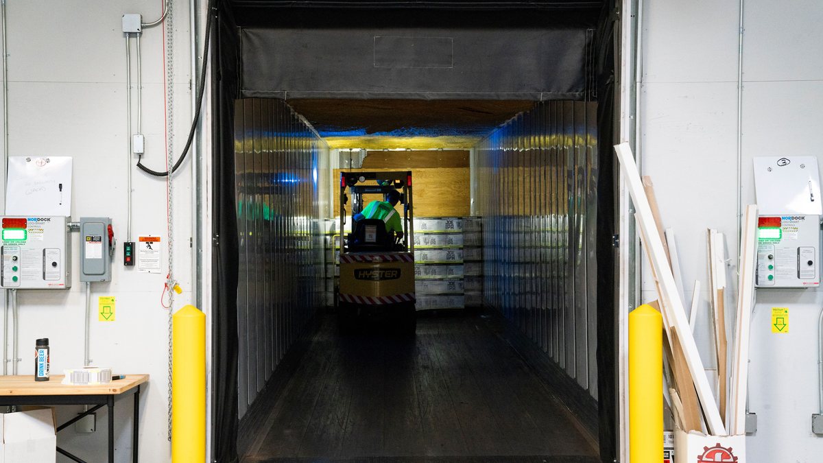 Forklift inside a trailer at a loading dock — TONU truck ordered not used claim documentation