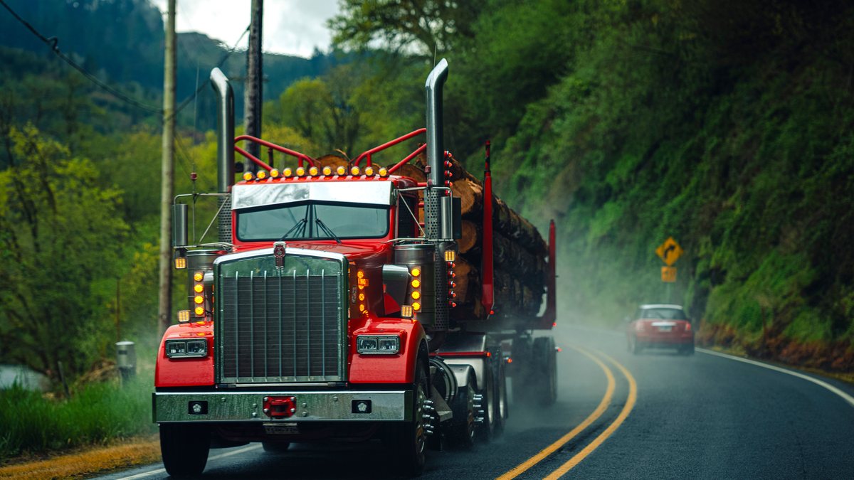 Why freight rates are high in 2026 — loaded semi truck on a US highway as freight capacity stays tight